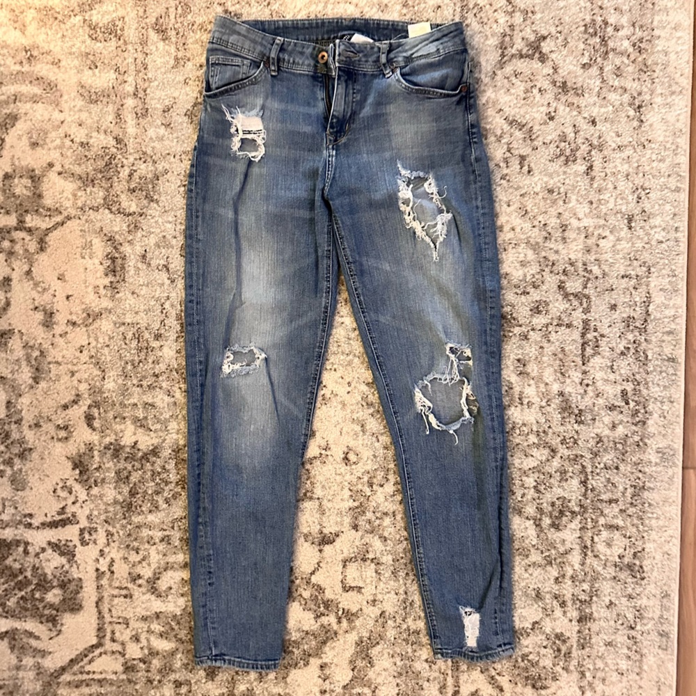 Distressed Blue Jeans